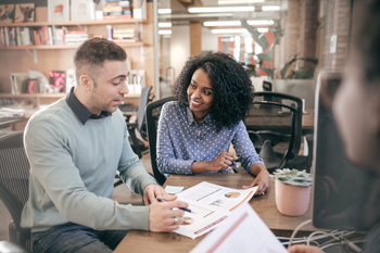A Property Manager explaining to client about a project / investment
