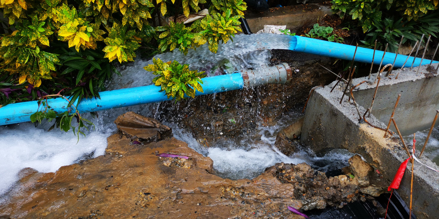 Water pipe break or Exposing a burst water main