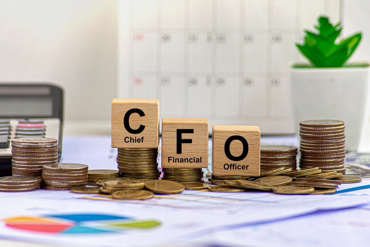 There is white cube with the word CFO. It is an abbreviation for Chief Financial Officer as eye-catching image.