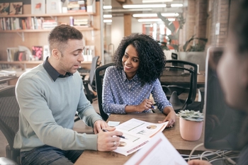 A Property Manager explaining to the client about a project / investment