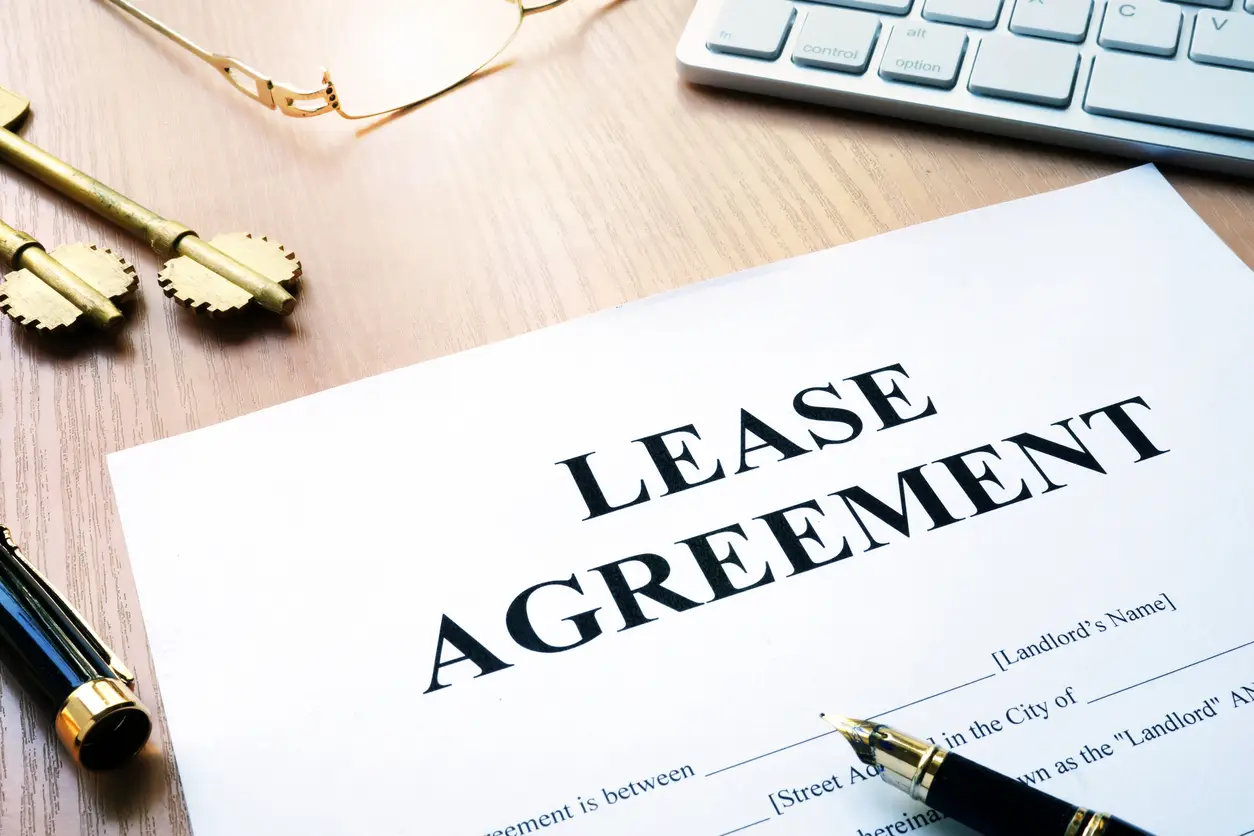 rental-lease-agreement-form-on-an-office-desk.webp
