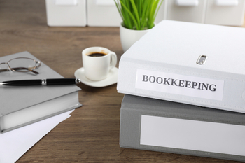 Bookkeeping Binders and folders on desk