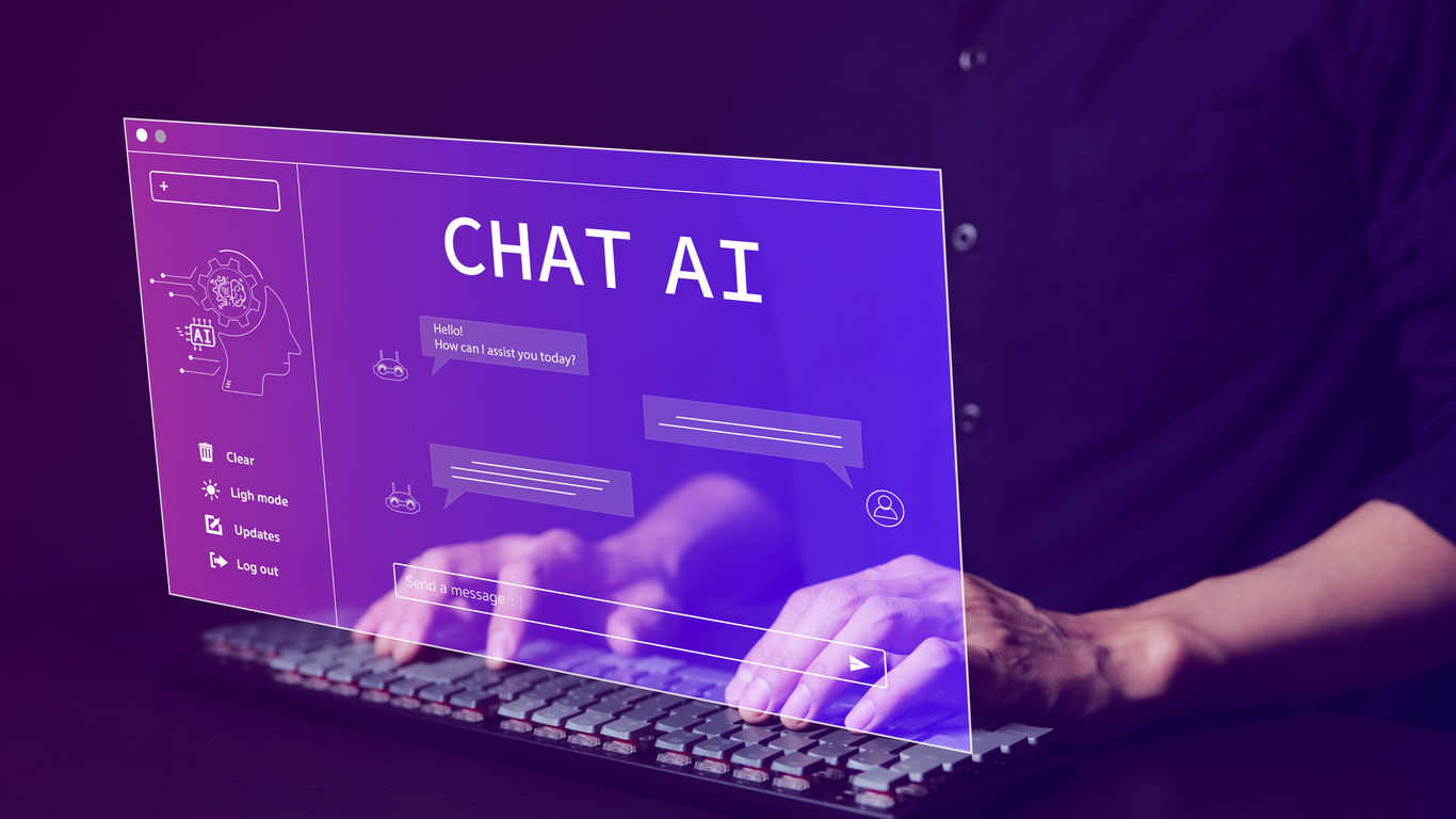 A.I., Chat with AI or Artificial Intelligence technology. Man using a laptop computer chatting with an intelligent artificial intelligence asks for the answers he wants.