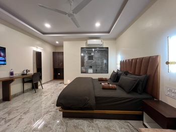 Resort lawn and walkways at Aranyam’s Tent Camping