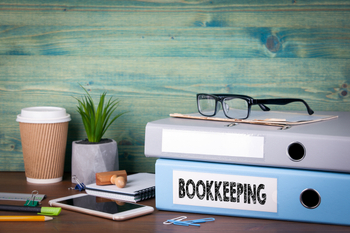 Bookkeeping Binders on desk in the office