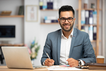 Young businessman working in office