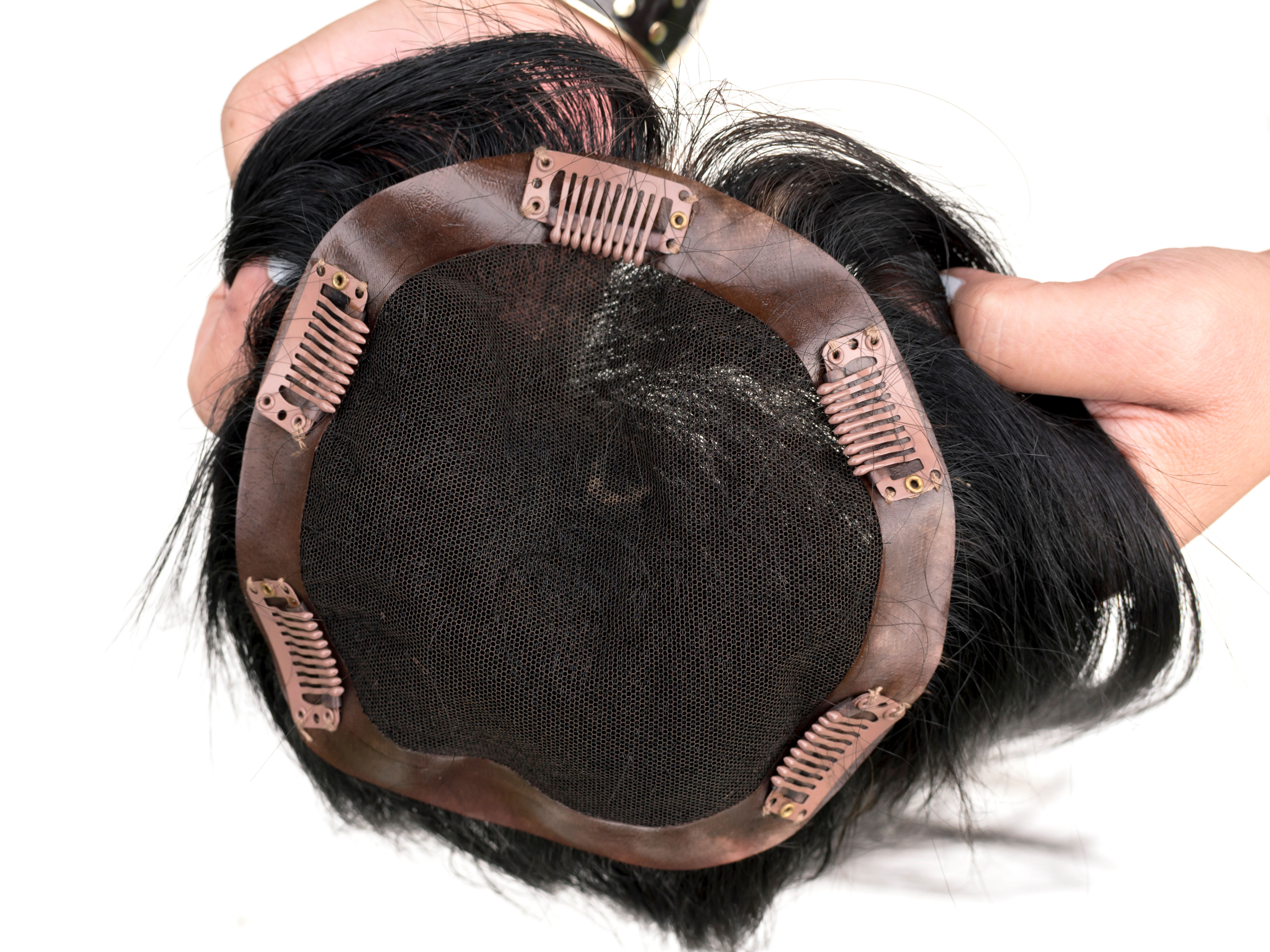 Is There a Right Way to Apply Hair Toppers for a Perfectly Natural Look? Holding Hair Topper
