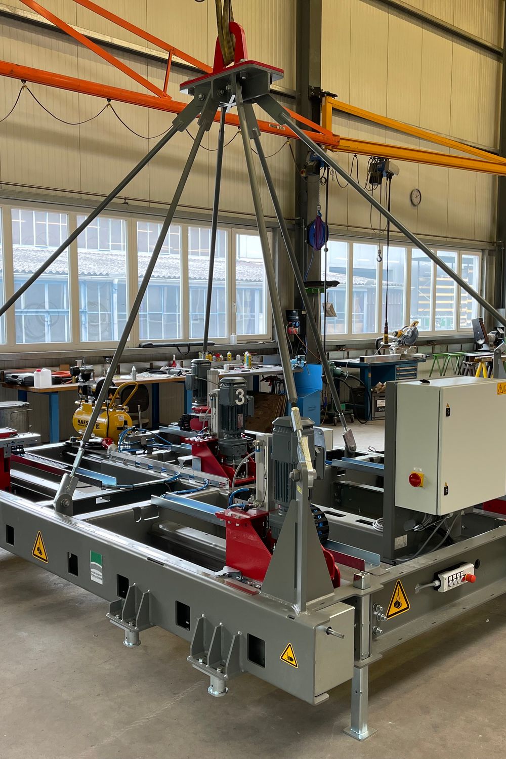 Spindle frame for track slabs