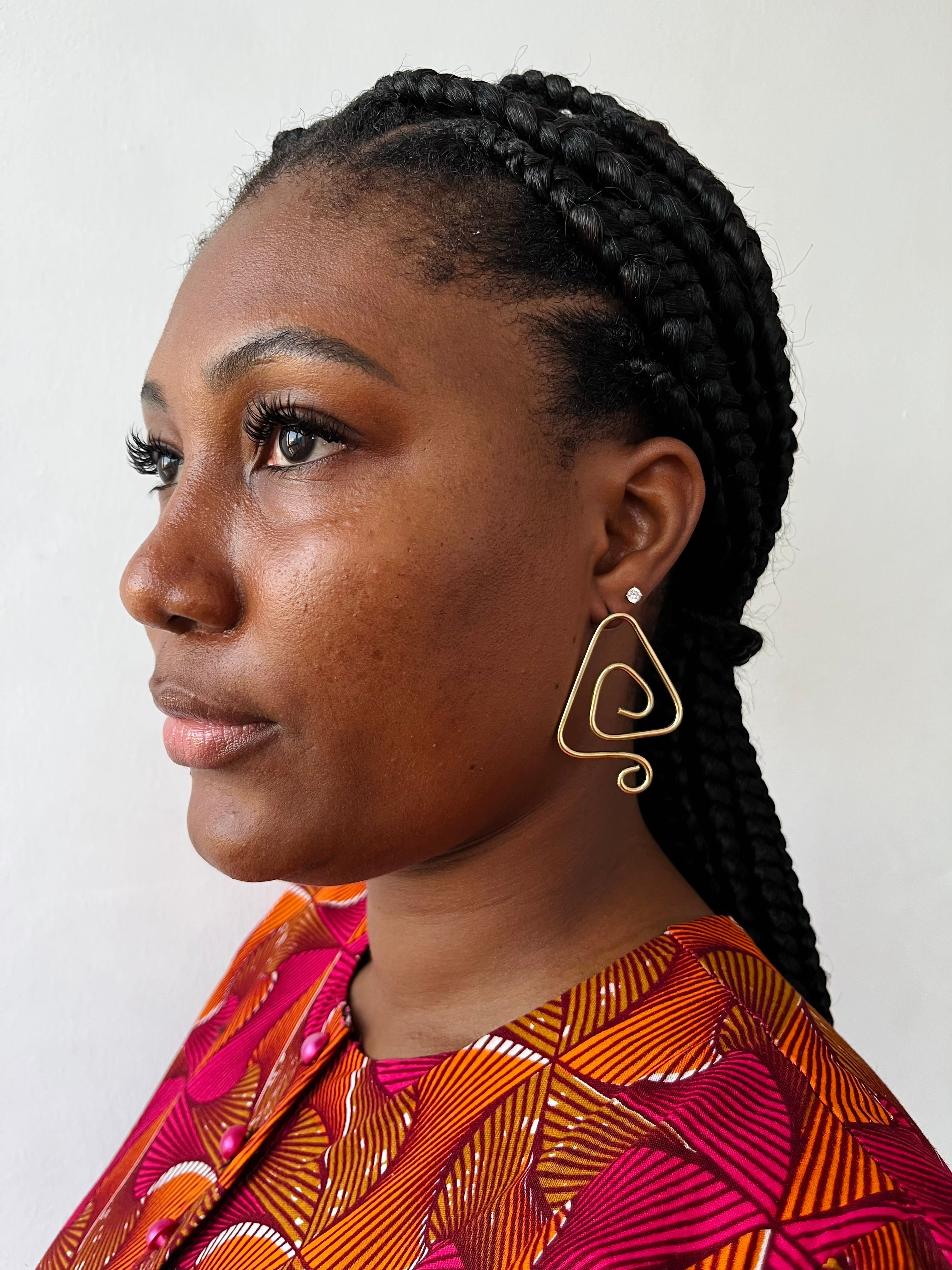 Triangular statement earrings
