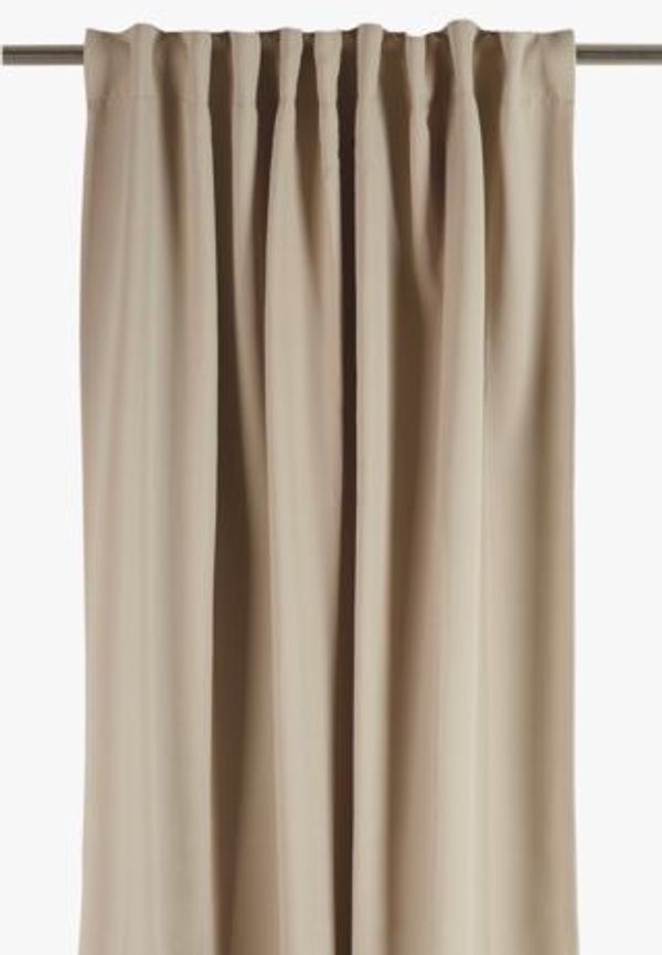 Beige hemtex-mörkläggningsgardin i cool modell.