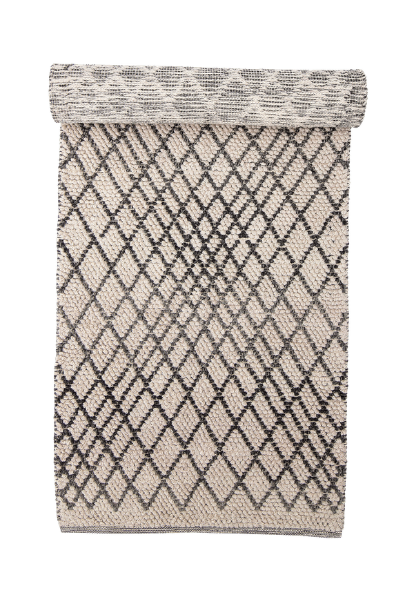 Grå Bloomingville-bomullsmatta i moderiktig modell.