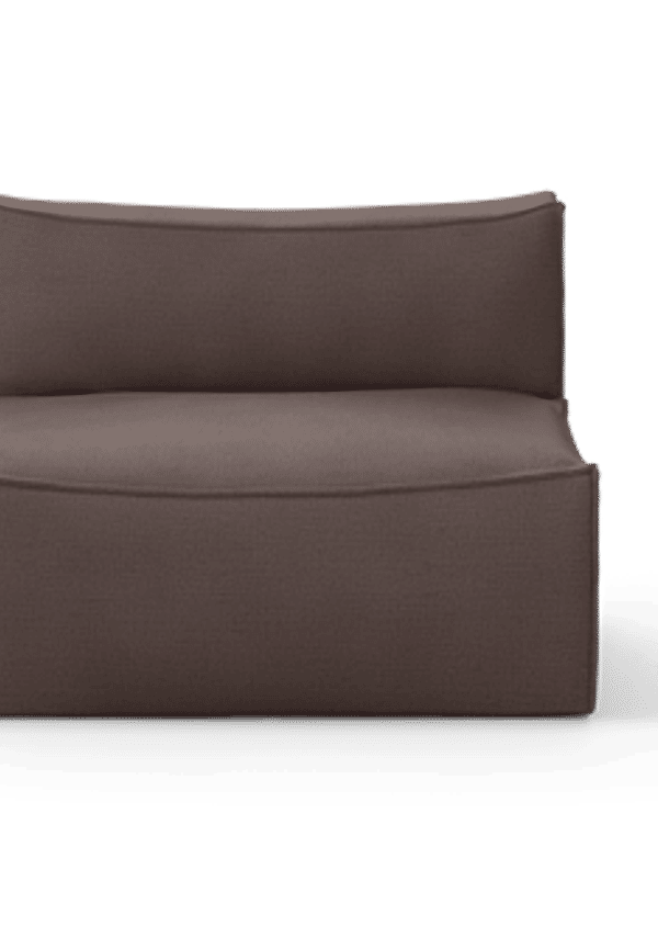 Brun FERM LIVING-bomullsfåtölj i stilriktig modell.