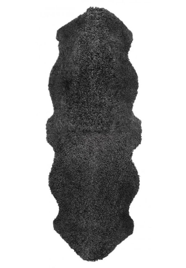 Skinnwille fårskinnsmatta som passar perfekt till sommaren 2025!