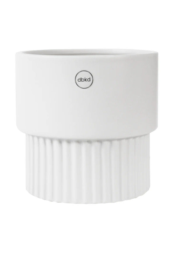 Vit DBKD-kruka i moderiktig modell.