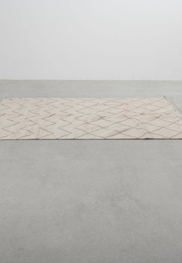 Trendig ullmatta i beiget från Decotique.