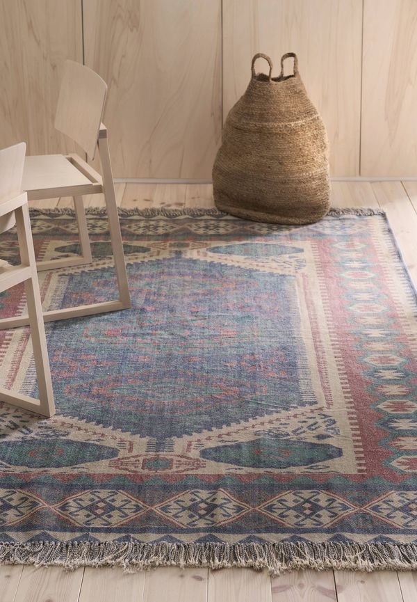 Blå Ellos-matta i ikonisk modell.