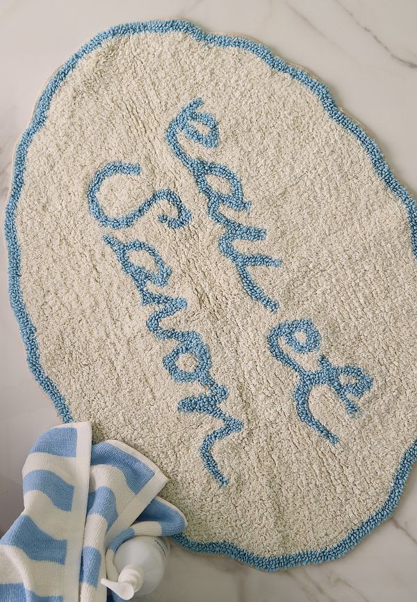 Elegant ellos matta i blå färg gjord i bomull.