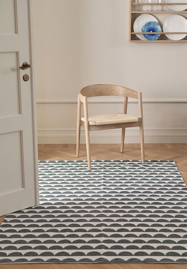 Superfin ellos home matta i blå färg gjord i bomull.