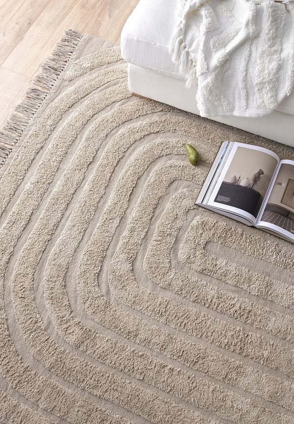 Riktigt fin ellos home matta i beige färg gjord i bomull.