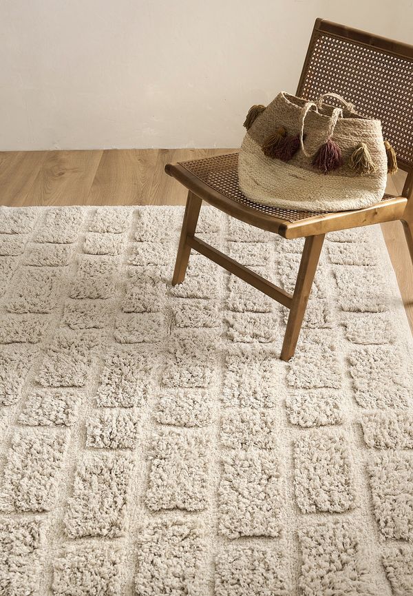 Jättesnygg ellos matta i vit färg gjord i bomull.