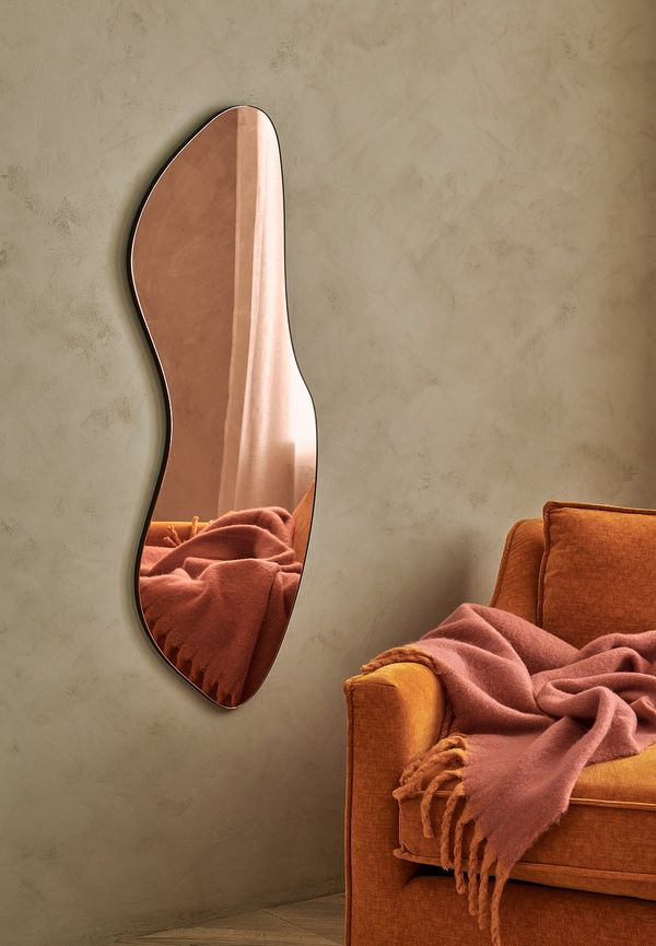 Otroligt fin spegel i rosa från Ellos Home.