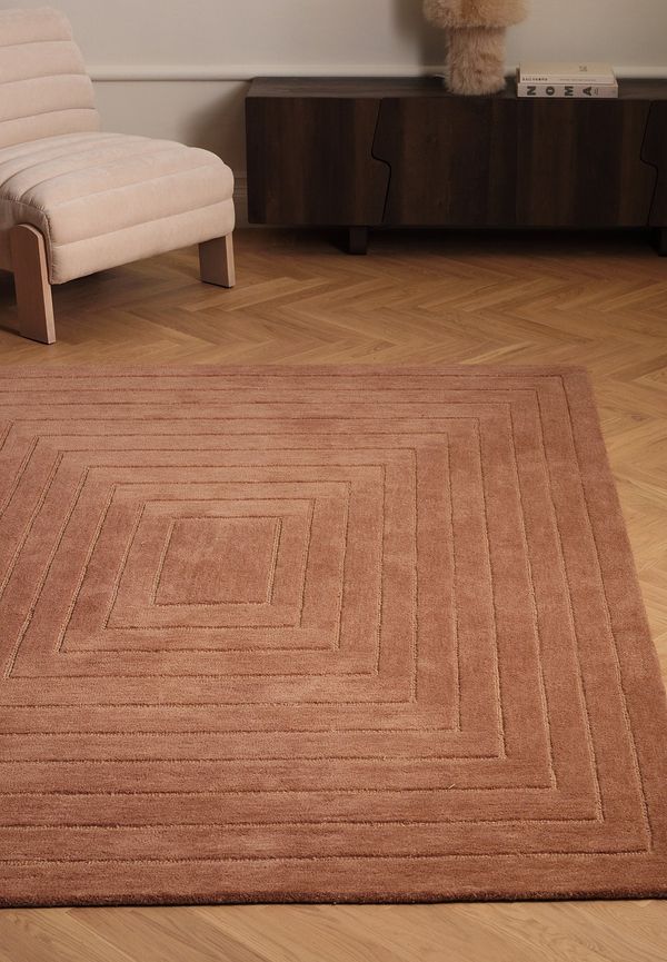 Komfortabel ellos matta i rosa färg gjord i ull.