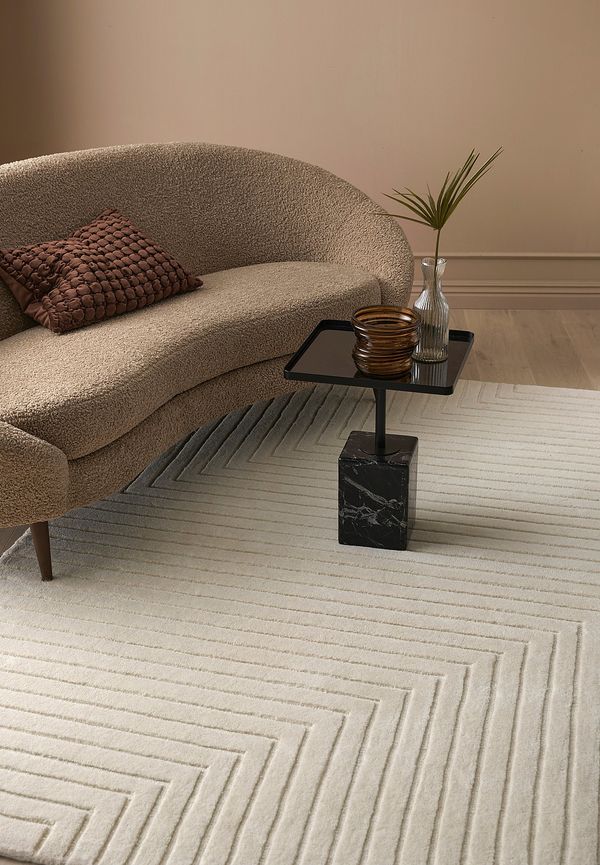 Klassisk ellos home matta i vit färg gjord i ull.