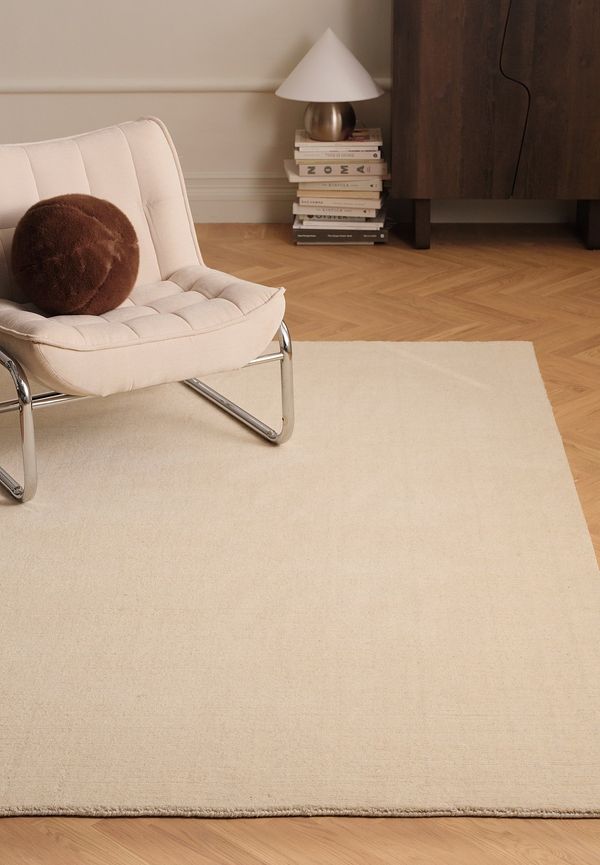 Vit Ellos Home-ullmatta i riktigt fin modell.