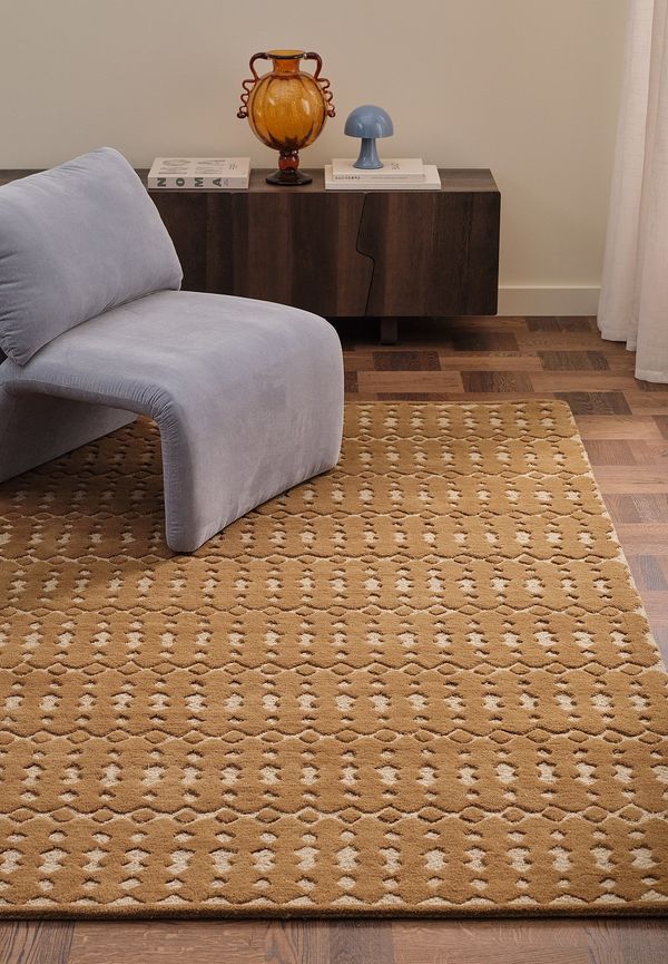 Komfortabel halkskyddsmatta i brun färg gjord i bomull.