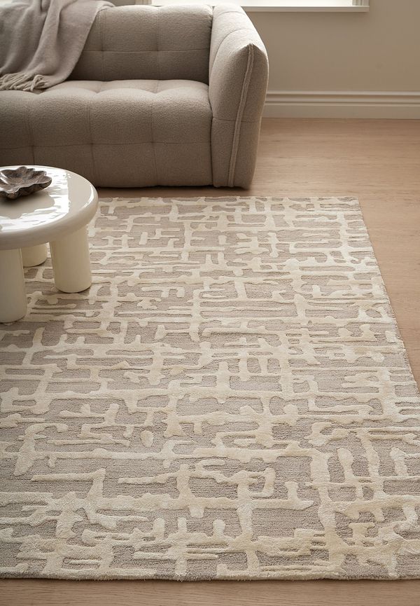 Ikonisk ellos matta i vit färg gjord i viskos.