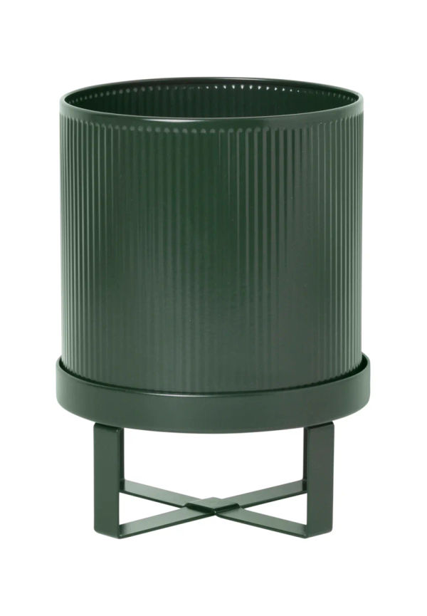 Grön FERM LIVING-kruka i snygg modell.