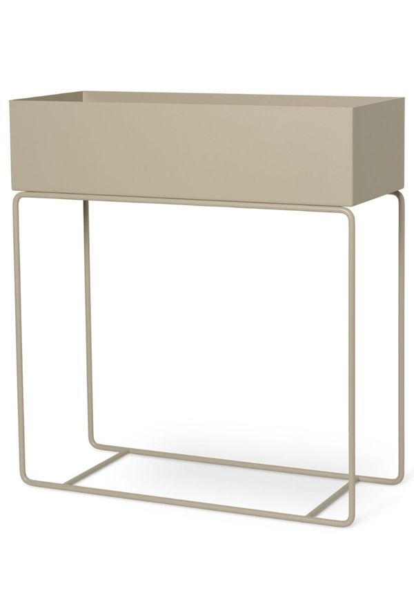 Beige FERM LIVING-blomlåda i moderiktig modell.
