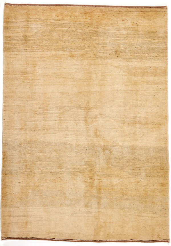 Beige ullmatta som passar perfekt till sommaren 2025!