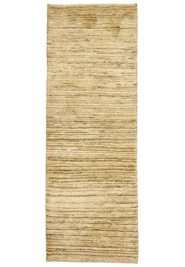 Beige ullmatta som passar perfekt till sommaren 2025!