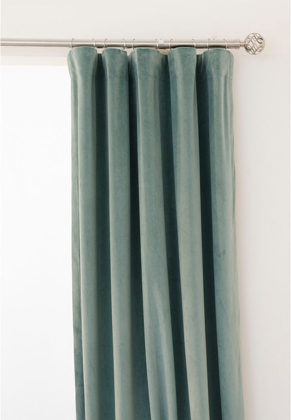 Söt gardin i grönt från Hasta.