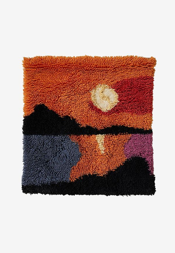 Söt ullmatta i oranget från HKliving.