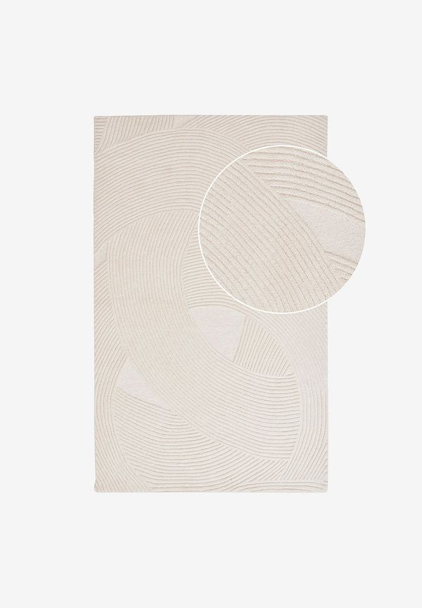 Supersnygg matta i vit färg gjord i ull.