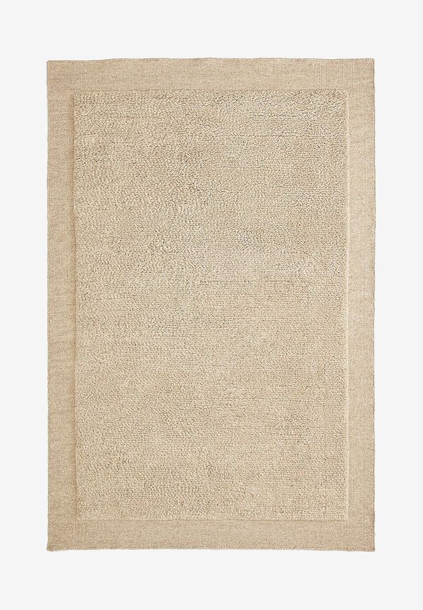 Jättefin beige ullmatta 2025 från Kave Home.