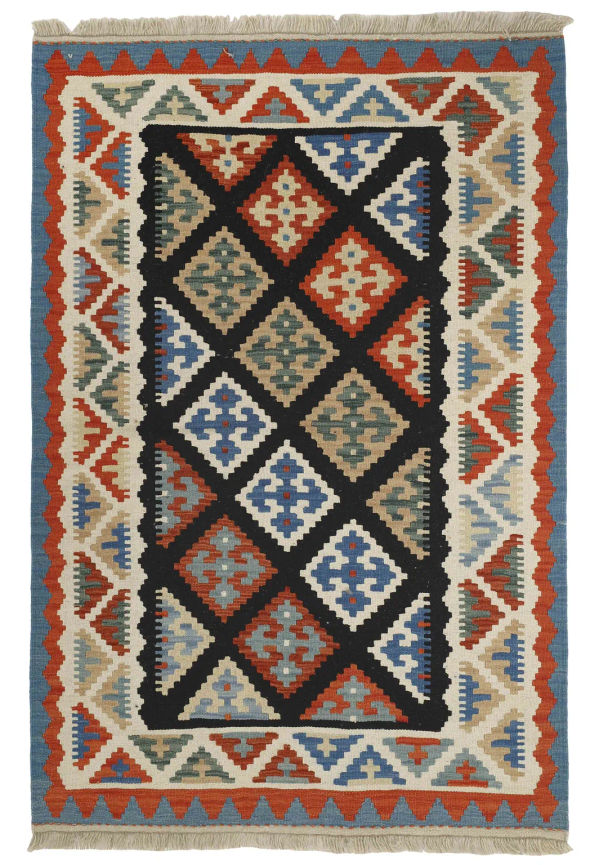 Flerfärgad ullmatta som passar perfekt till våren 2025!