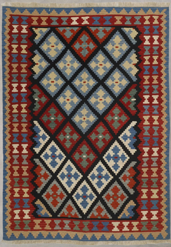 Flerfärgad ullmatta som passar perfekt till våren 2025!