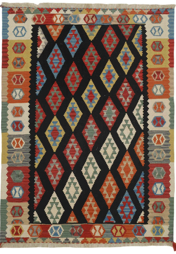 Flerfärgad ullmatta som passar perfekt till våren 2025!