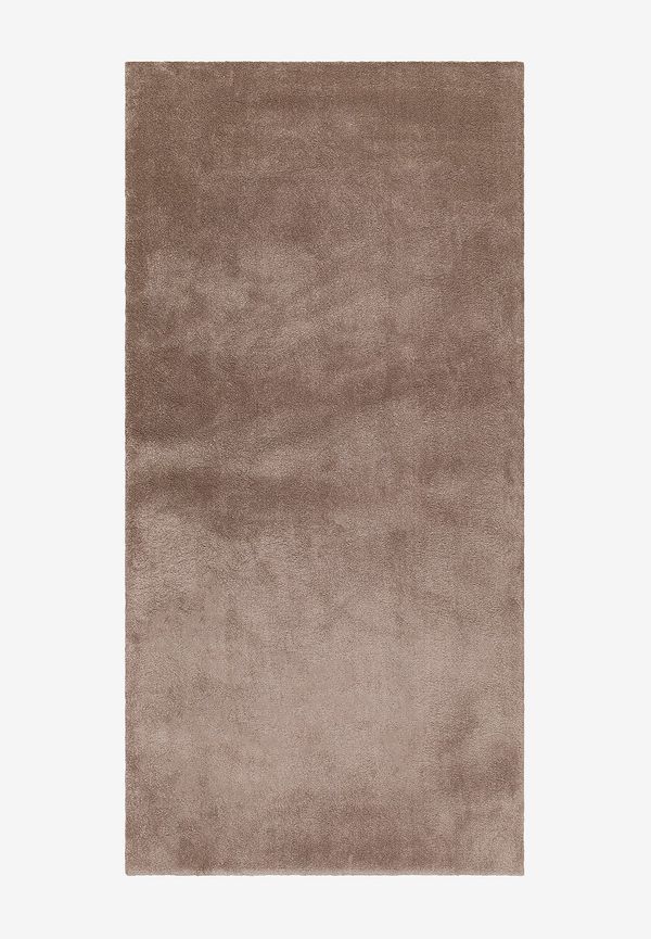 Härlig ryamatta i brunt från KM Home.