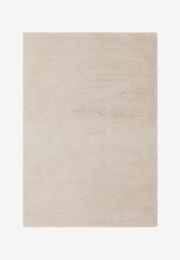 Klassisk ryamatta i vitt från KM Home.