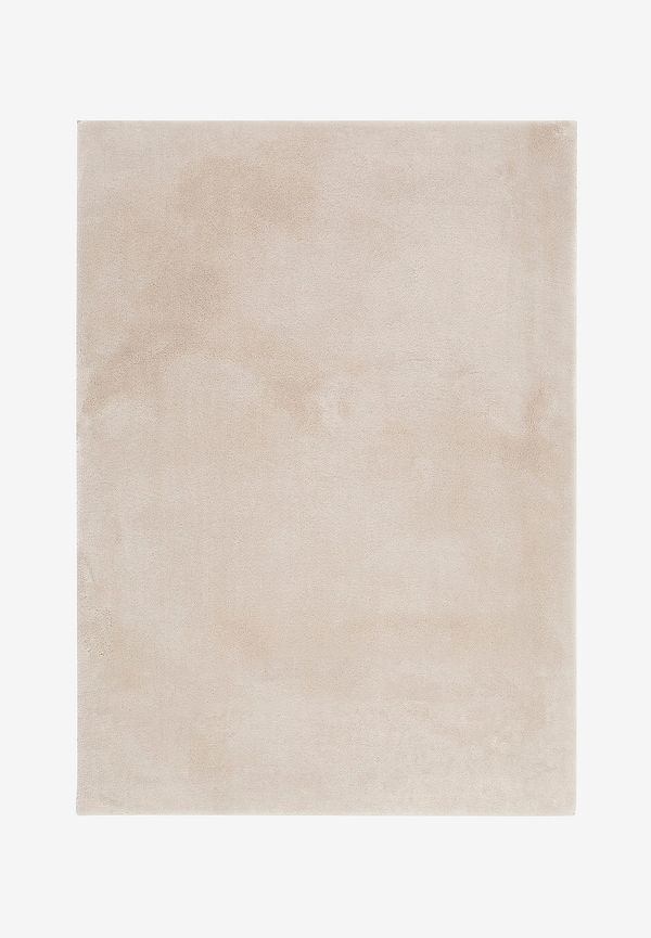 Beige KM Home-matta i stilriktig modell.