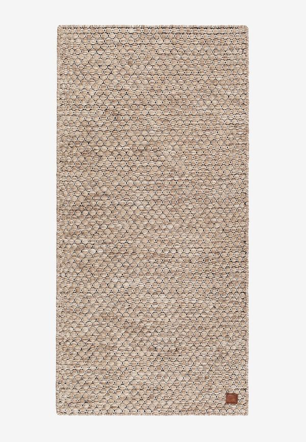 Elegant ullmatta i beiget från KM Home.