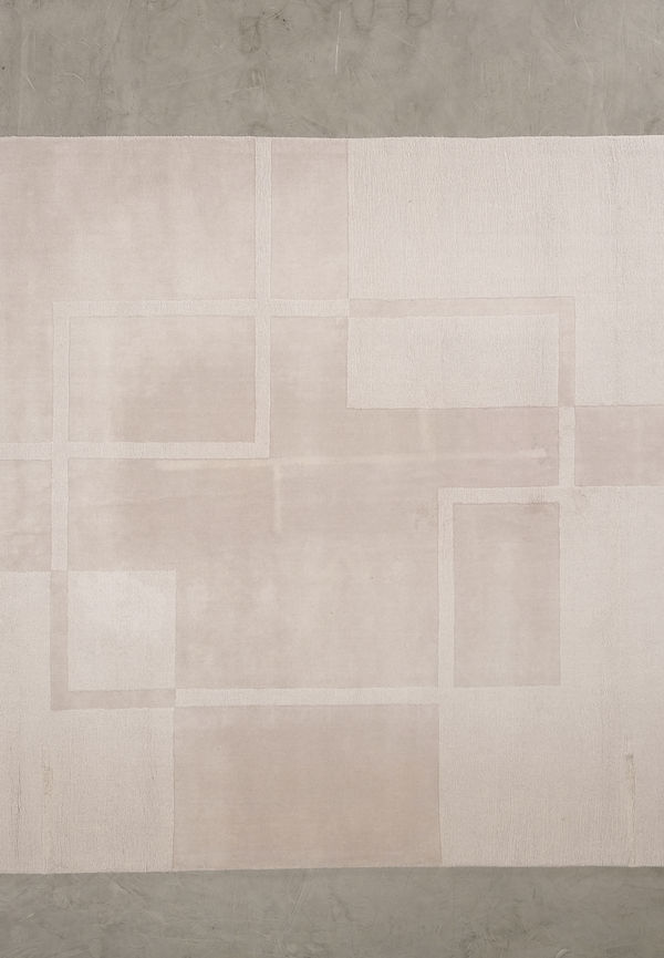 Skön ullmatta i vitt från Layered.