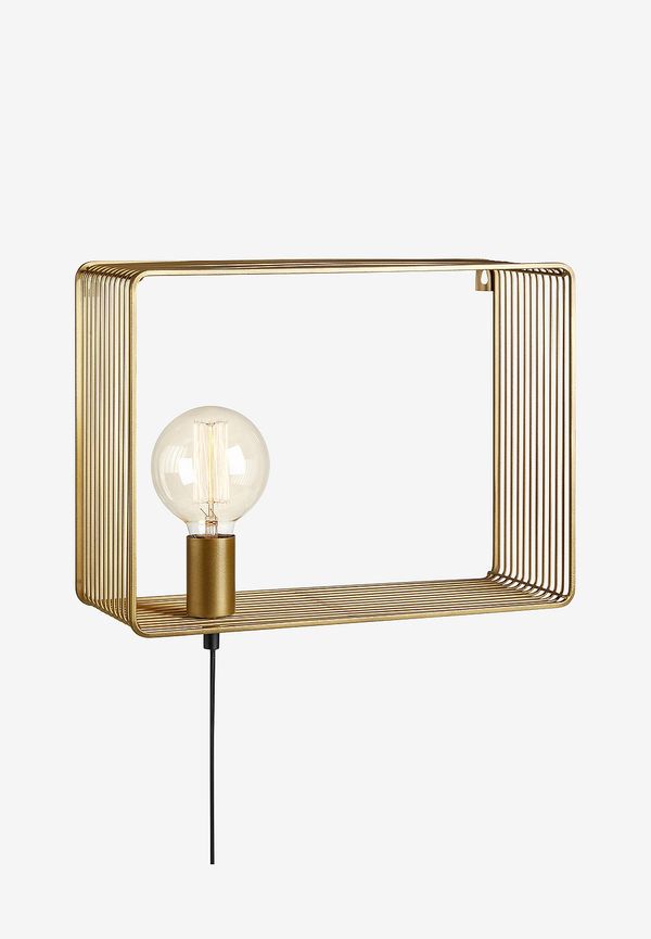 Riktigt fin lampa i guld från Markslöjd.