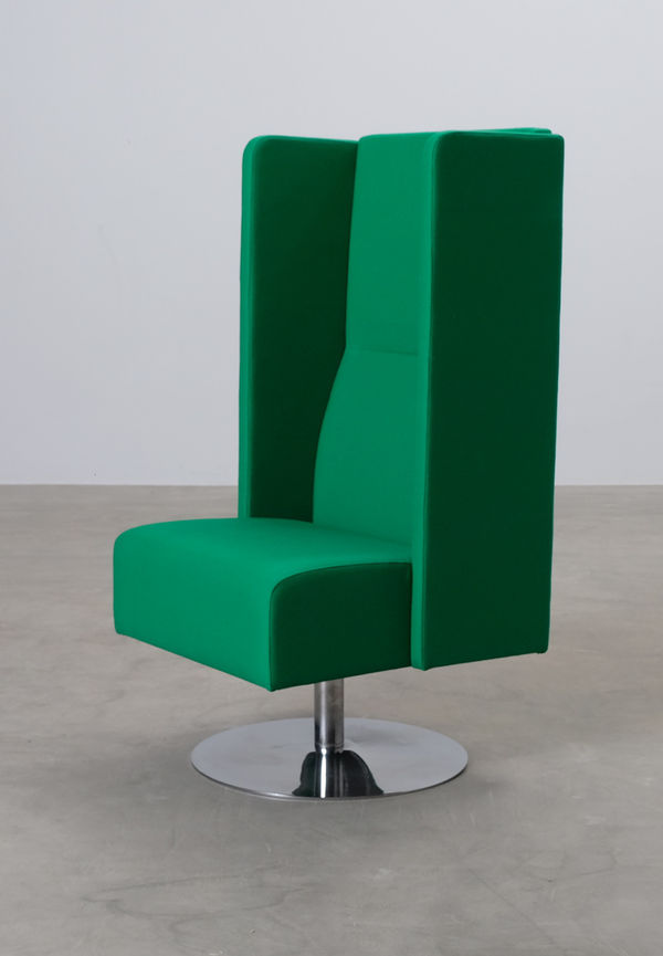 Grön Materia-fåtölj i jättesnygg modell.