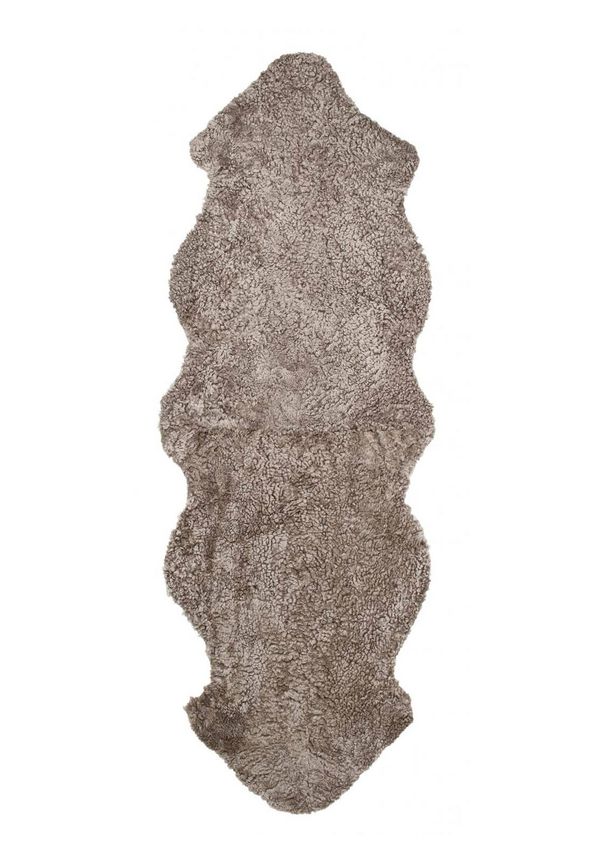 Skinnwille fårskinnsmatta som passar perfekt till sommaren 2025!