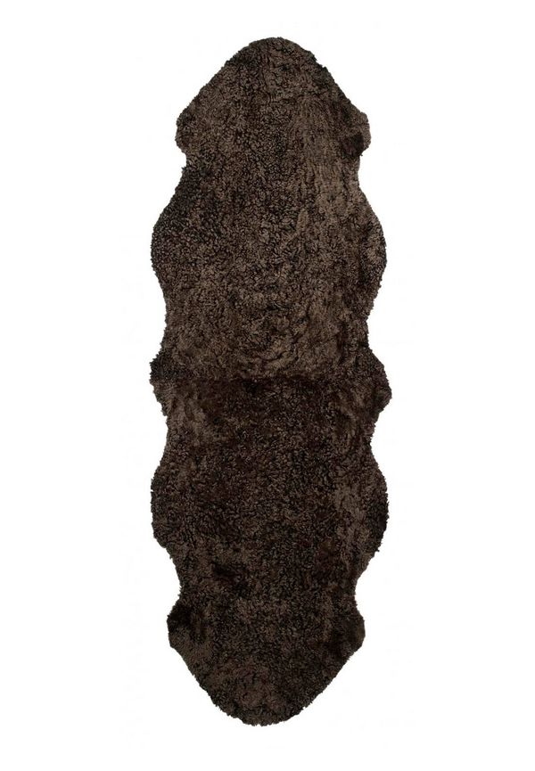 Skinnwille fårskinnsmatta som passar perfekt till sommaren 2025!